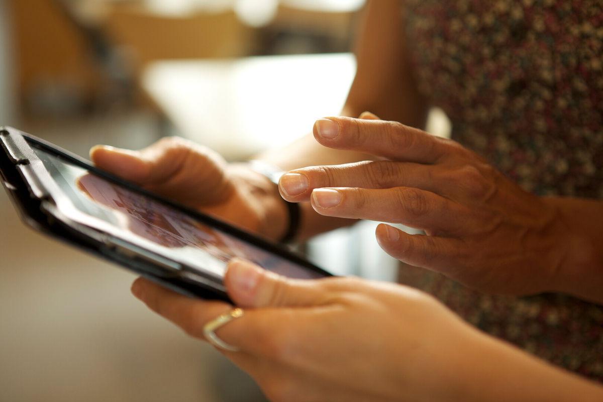 woman with ipad